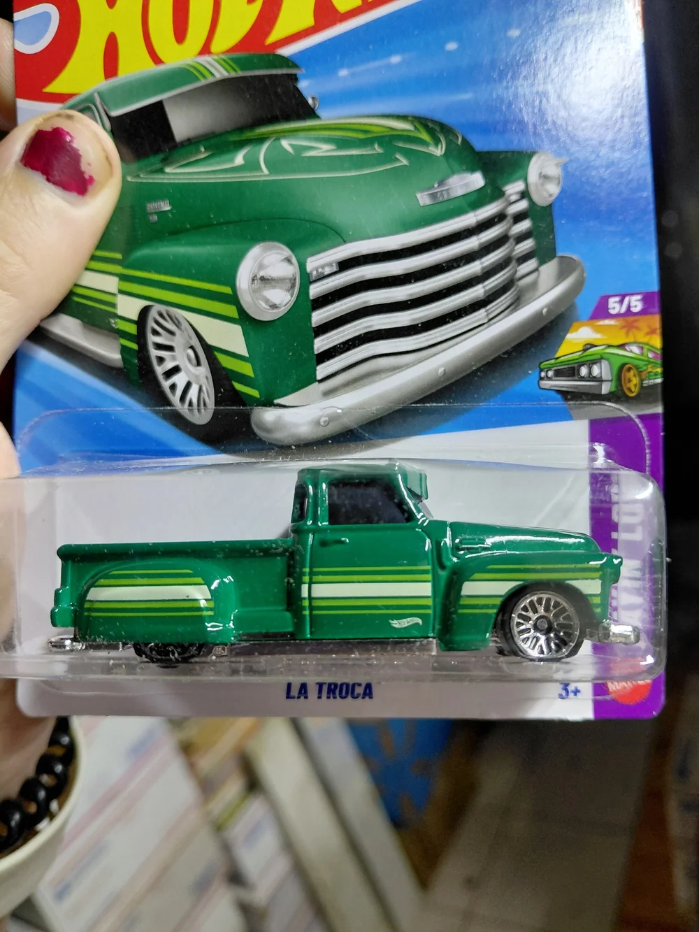green Hot Wheels La Troca is a 1:64 scale die-cast lowrider pickup truck from th